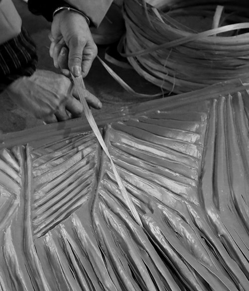 Artificial palm leaves bundled