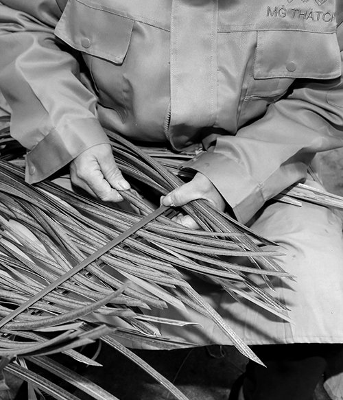 Woven interlaced artificial thatch